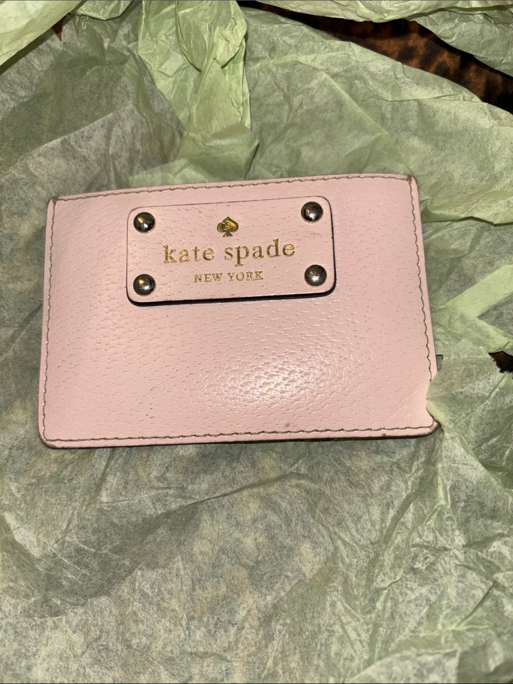 kate spade pale pink leather card holder with gold logo plate